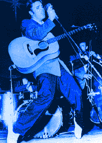 Young Elvis in the midst of one of his famous pelvic thrusts