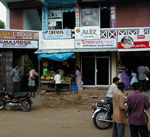 Maggie jumped down from the bus to search out some snacks at this stop.  