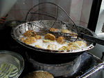 Ta'amaiyya being cooked.  Rather like falafel but with green stuff in it that makes it lighter.  