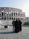 Tonsured monks at the Colosseum