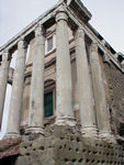 Temple fo Antoninus and Faustina. Antoninus built the place when his wife Faustina died.  After he died, teh dedication was extended to him.  In the Middle Ages a church was built inside the temple.  The Forum had been abandoned for a long time and was so covered with earth that the door was once level with the ground.