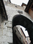 Arched gate in city wall, originally built by the Etruscans