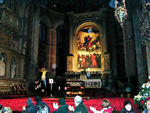 Titian's Mary Ascending into Heaven on the altar of the Basilica of Santa Maria Gloriosa dei Frari.  One of the few pieces of Venetian art worth preserving.  We went to see an organ and horn concert here.  The place was cold and damp.  There's a pipe organ behind the painting and a space heater blew hot air onto the performers and the painting.  It's amazing it has lasted from the 16th century.  This is also the church in which Titian is buried beneath a marble rendering of this painting.  The church also has a great tomb for one of the doges featuring bodies rising from the earth.  They look like you might imagine bodies rising from the ground might look.  Needless to say we liked them.