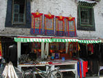 Thanka stall.  The Jokhang is surrounded by stall selling souvenirs, monk outfits, beads, prayer wheels, and a whole bunch of other stuff.