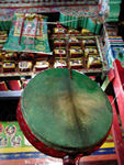 Drum with holy books in the background