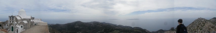 View from Profit Elias.  On the left is the church.  The thing that looks like a sidewalk is the roof over the monk's cells.  Out in front of Tote are the Cyclades - islands of which one is Sifnos