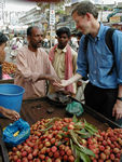 Mark buying litchi (that's lee chee) fruit.  He is in the middle of haggling over the price.
